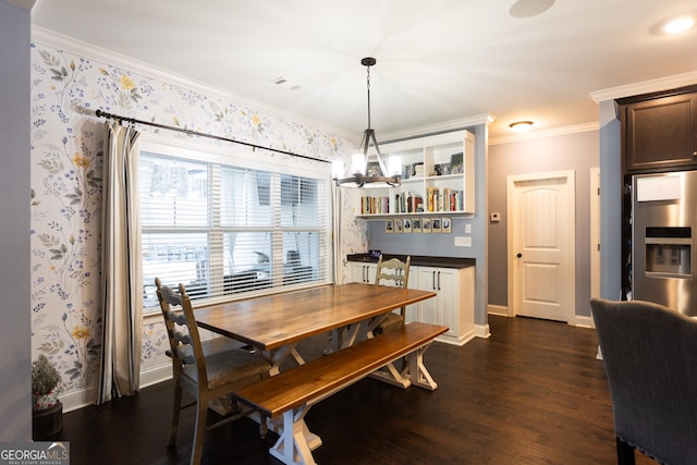 dining space featuring dark wood-style floors, wallpapered walls, baseboards, and crown molding