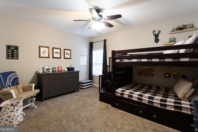 carpeted bedroom with a ceiling fan