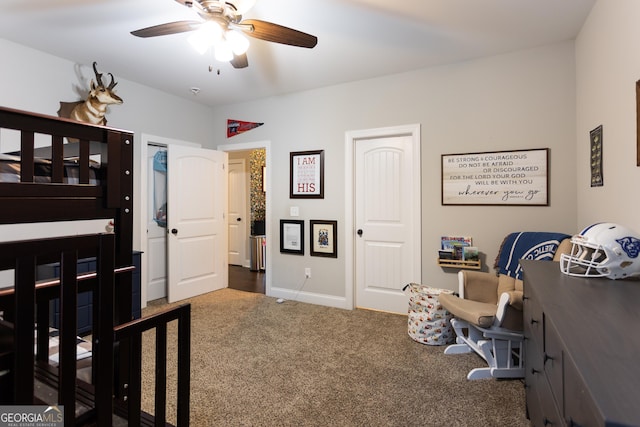 bedroom featuring carpet, baseboards, and a ceiling fan