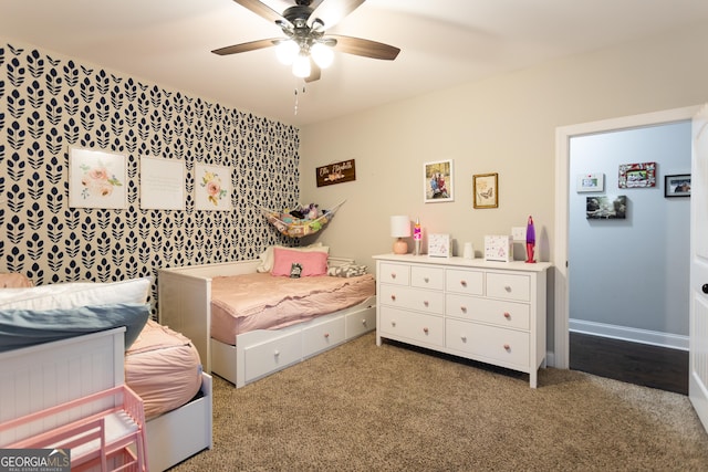 bedroom featuring carpet floors, ceiling fan, and baseboards