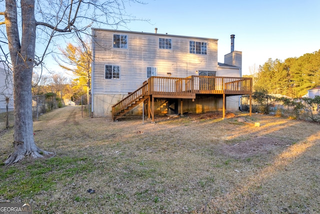 back of house with stairway and a wooden deck