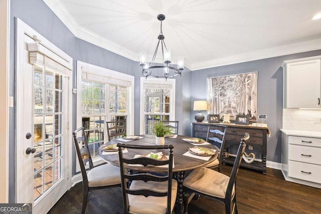 dining room with dark wood-style floors, baseboards, and crown molding