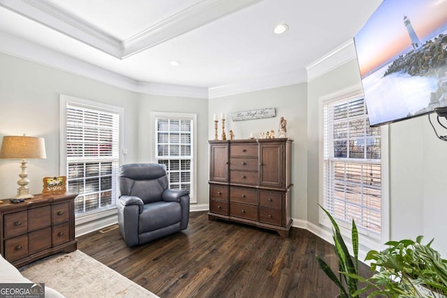 living area with ornamental molding, recessed lighting, dark wood finished floors, and baseboards