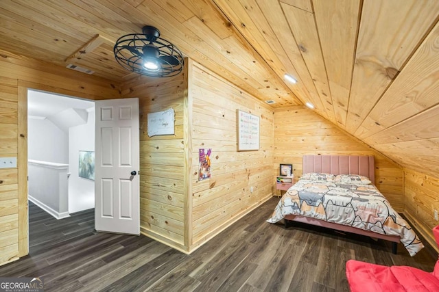 bedroom featuring wooden ceiling and wooden walls