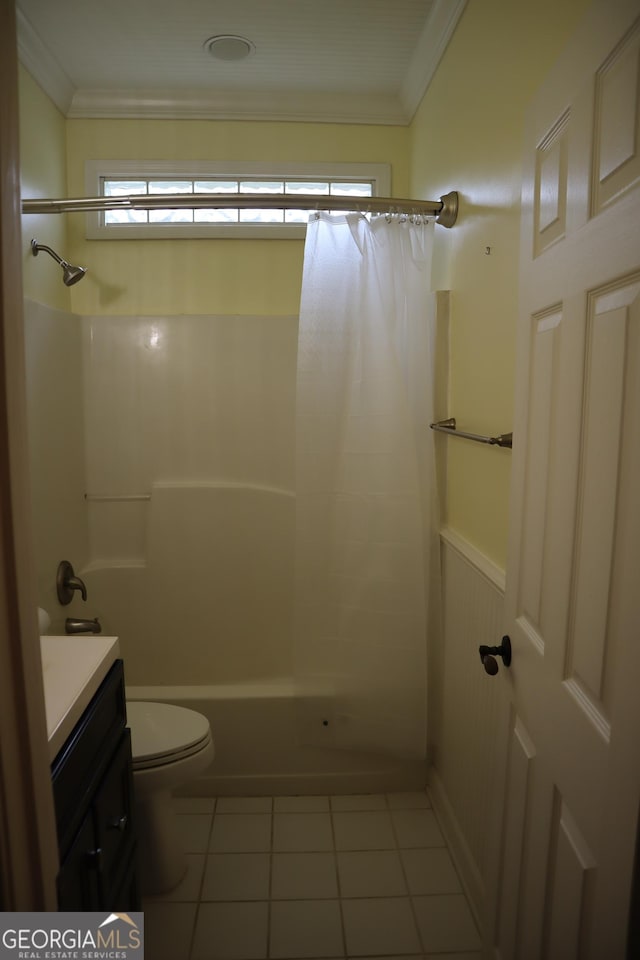bathroom with vanity, tile patterned floors, shower / bath combination with curtain, crown molding, and toilet