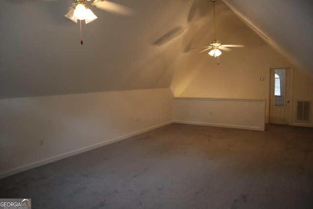 bonus room with lofted ceiling, baseboards, visible vents, and carpet flooring