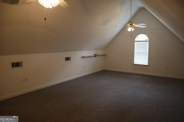 additional living space featuring visible vents, baseboards, a ceiling fan, and vaulted ceiling