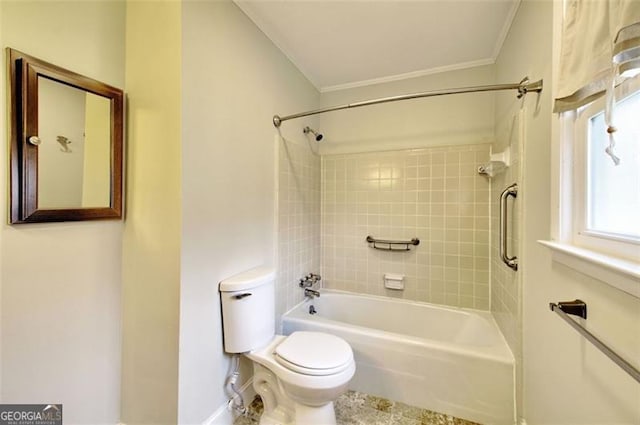 full bath with toilet, ornamental molding, and shower / washtub combination