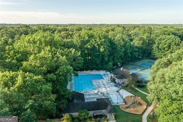 bird's eye view featuring a forest view