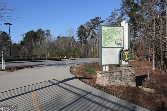 view of home's community featuring driveway