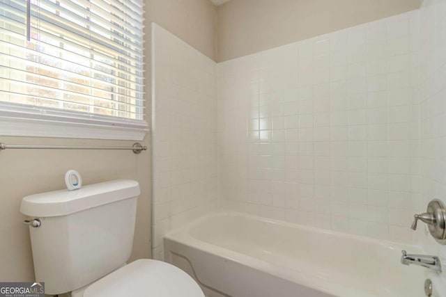 full bath with toilet and tub / shower combination