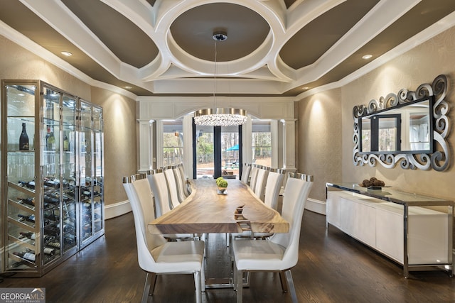 dining room with dark wood finished floors, coffered ceiling, and ornamental molding