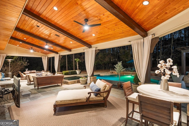 view of patio / terrace with an outdoor living space, an outdoor pool, and an in ground hot tub