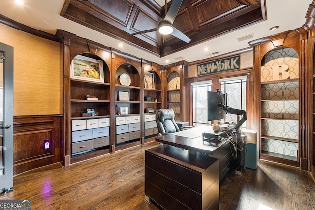 office space featuring visible vents, dark wood-style flooring, coffered ceiling, and ornamental molding