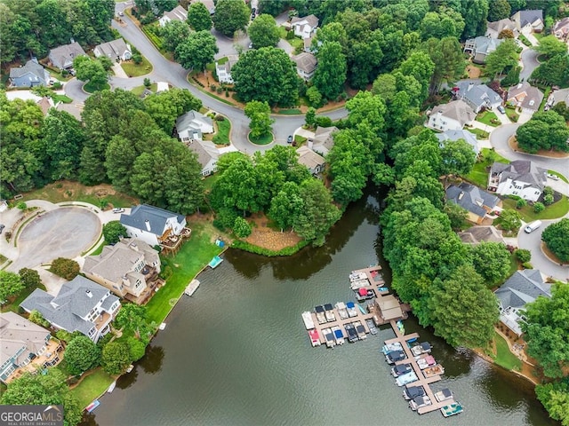 aerial view with a residential view and a water view