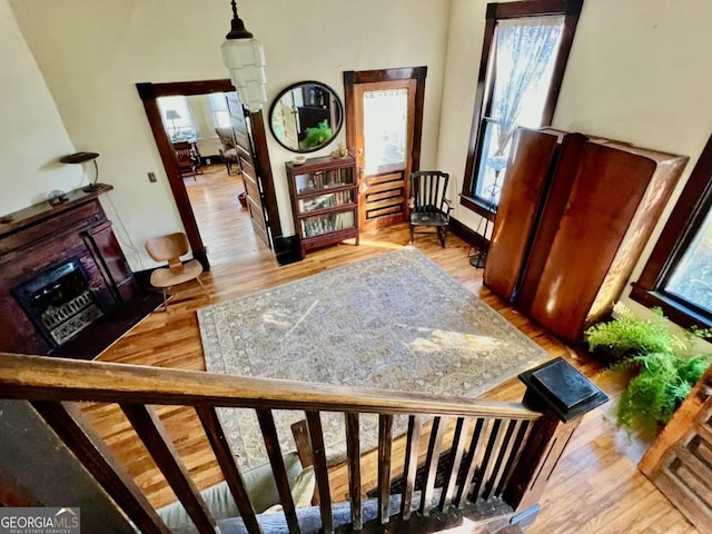 interior space featuring a fireplace and wood finished floors