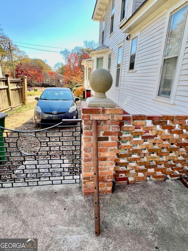 view of patio featuring fence