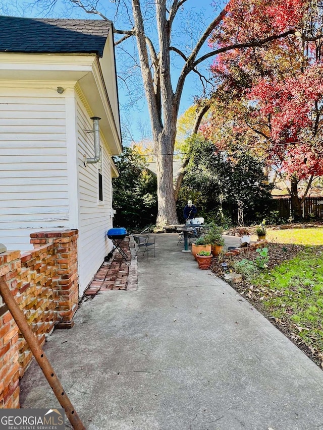 view of patio with fence