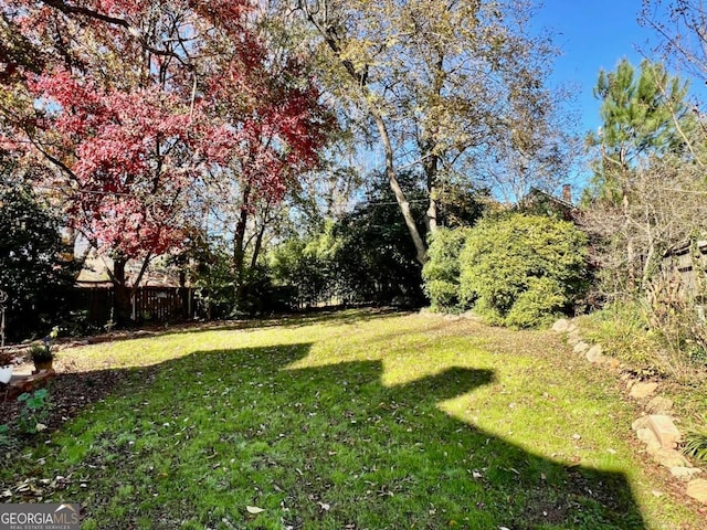 view of yard featuring fence