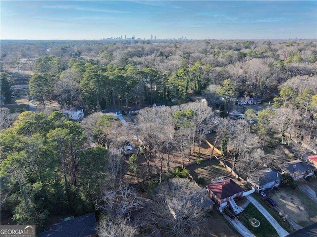 aerial view featuring a view of trees