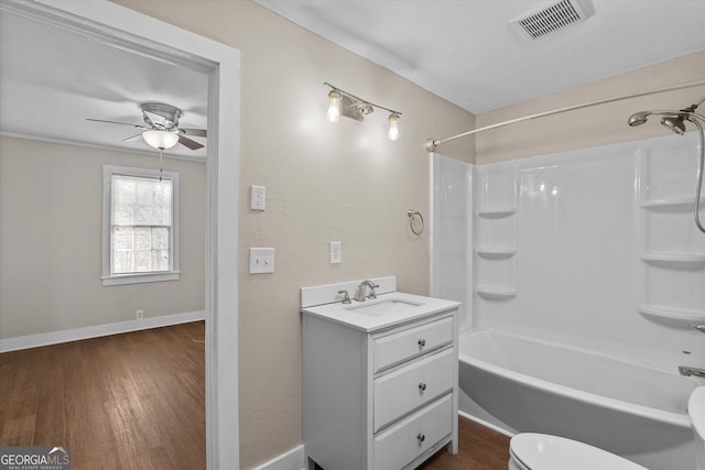 full bath with ceiling fan, wood finished floors, visible vents, and baseboards