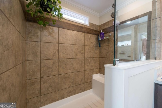 bathroom with crown molding and walk in shower