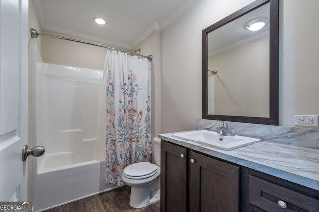 full bathroom featuring shower / tub combo, toilet, wood finished floors, crown molding, and vanity