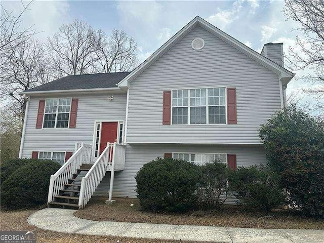 bi-level home with a chimney