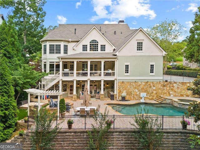 back of property with a patio, an outdoor hangout area, fence, stairs, and a pergola