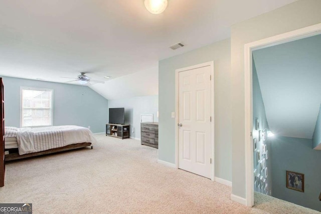 bedroom with visible vents, a ceiling fan, carpet flooring, baseboards, and vaulted ceiling