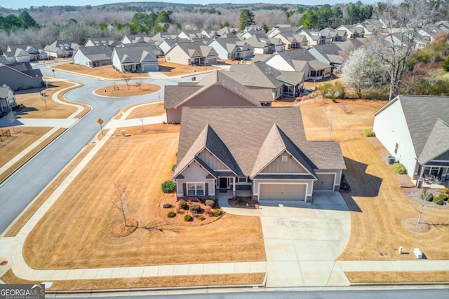 drone / aerial view with a residential view