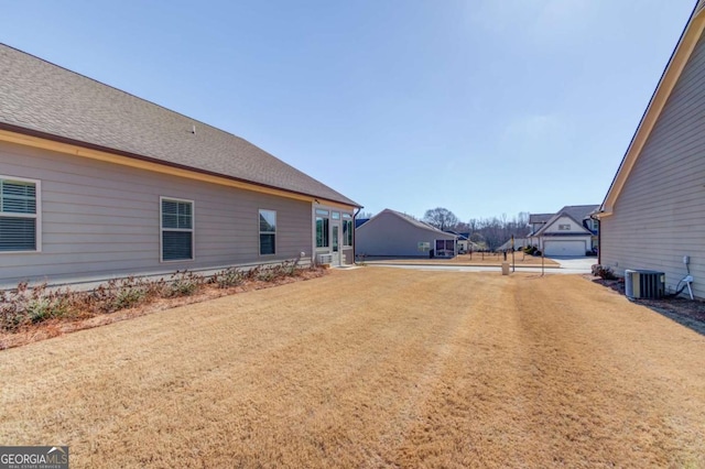 view of yard featuring central AC