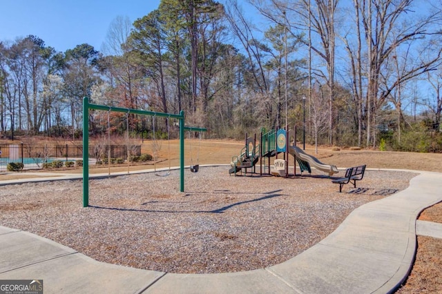 community play area featuring fence