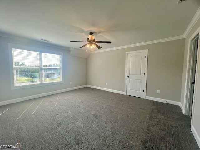 unfurnished bedroom featuring ornamental molding, carpet, and visible vents