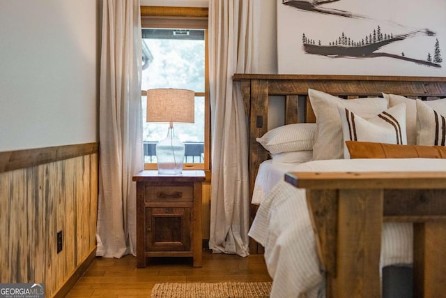 bedroom featuring wood finished floors