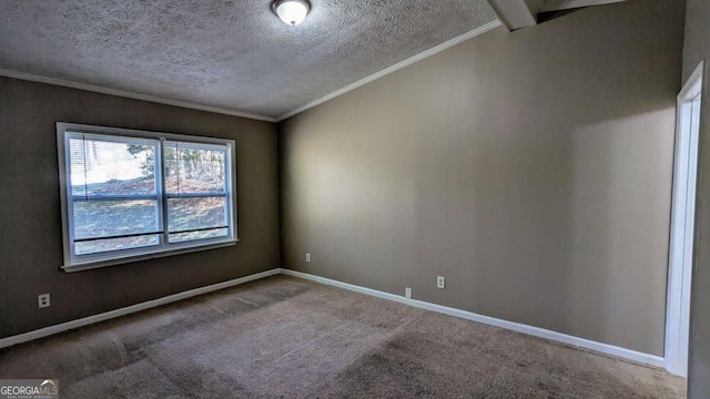 empty room featuring a textured ceiling, carpet floors, ornamental molding, and baseboards