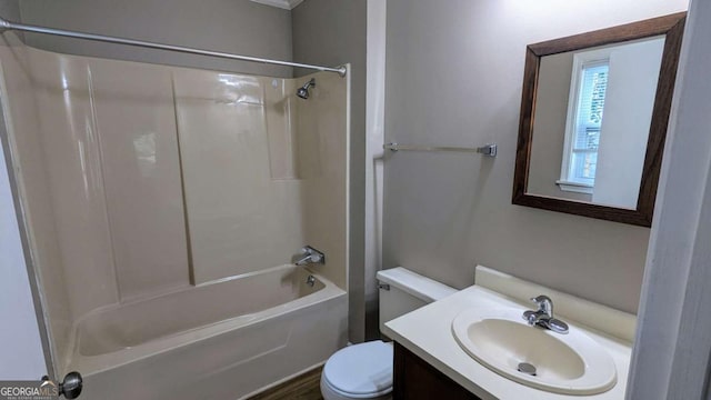 full bath with toilet, washtub / shower combination, and vanity