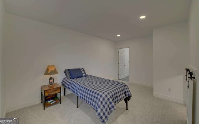 bedroom with recessed lighting, baseboards, and carpet