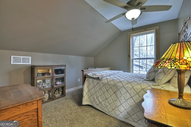 carpeted bedroom featuring visible vents, vaulted ceiling, baseboards, and ceiling fan