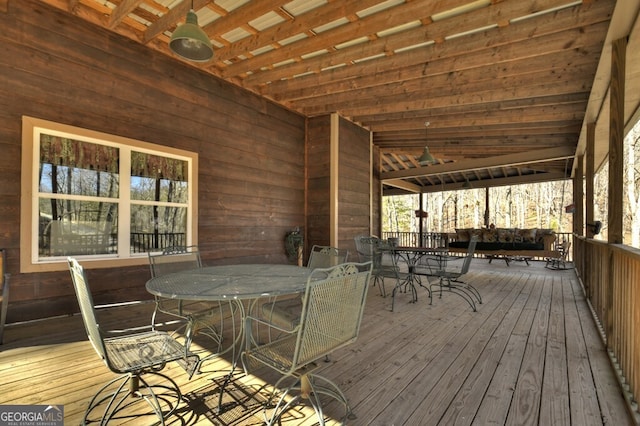 deck featuring outdoor dining space