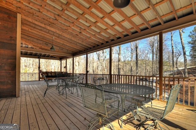 wooden deck with outdoor dining area