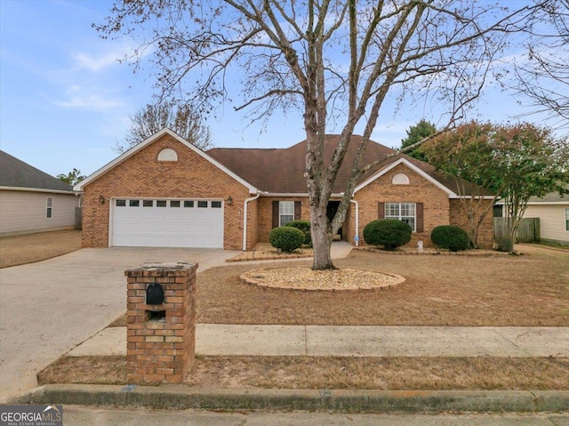 single story home featuring a garage, brick siding, and driveway