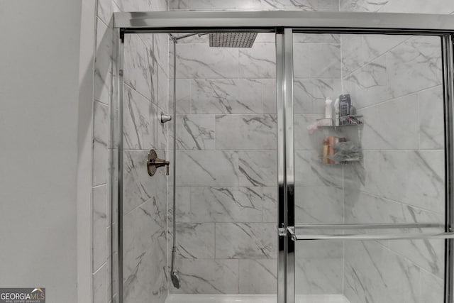 bathroom featuring a shower stall