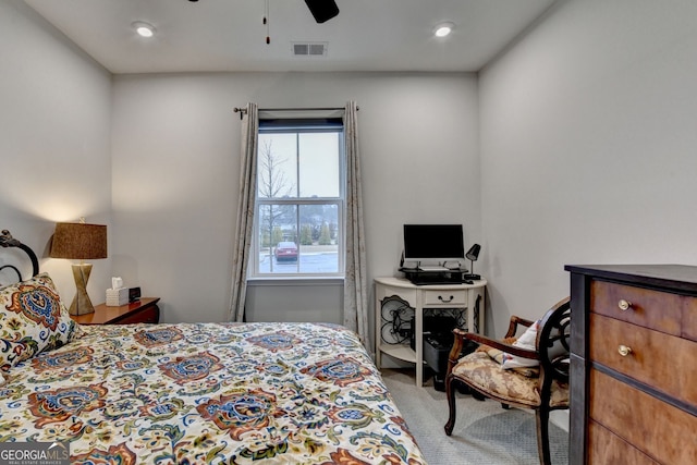 carpeted bedroom featuring a ceiling fan, visible vents, and recessed lighting