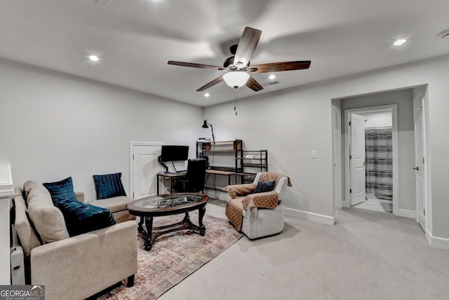 carpeted living room with recessed lighting, baseboards, and a ceiling fan