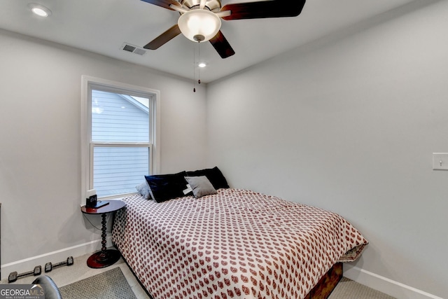 bedroom featuring visible vents, carpet flooring, baseboards, and ceiling fan