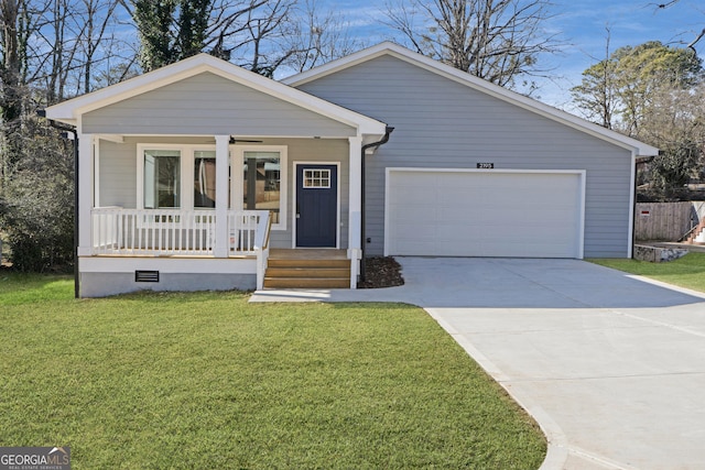 view of front of home with ceiling fan, a porch, a garage, concrete driveway, and a front yard