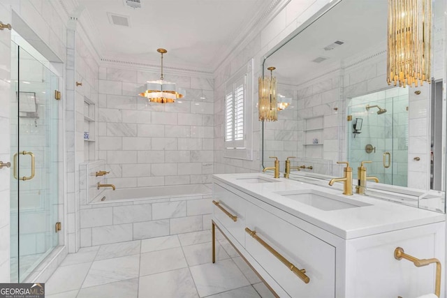 bathroom featuring a sink, a shower stall, a chandelier, and crown molding