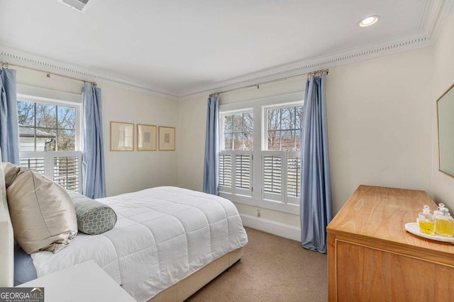 bedroom with recessed lighting, light colored carpet, baseboards, and ornamental molding