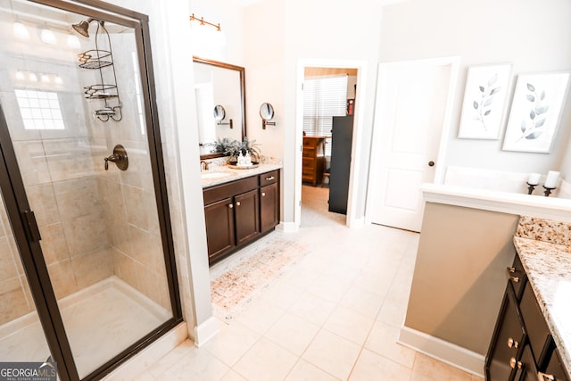 full bath featuring vanity and a shower stall